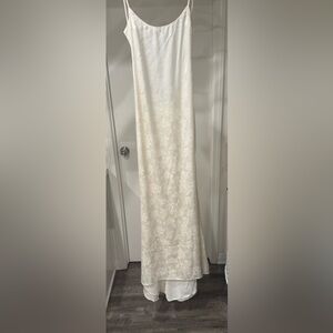 Reformation allium dress. Color ivory, sz 8. never warn, price tags attached.